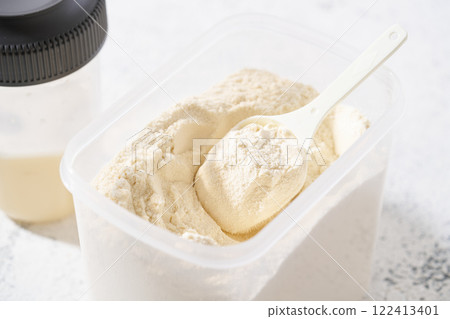 Protein powder in a container 122413401