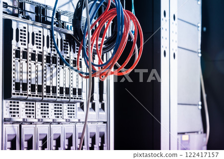 network cables connected into server inside data center 122417157