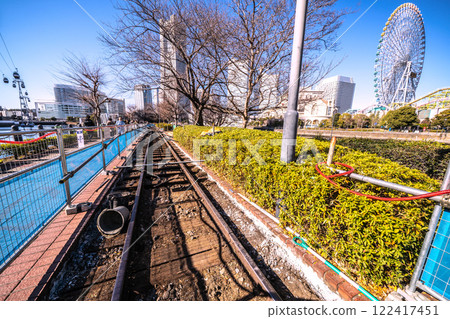Yokohama cityscape in Japan: Repairs to the Kishamichi road...Yokohama Landmark Tower and other buildings in the background...=January 22, 2025 122417451