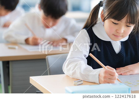 Children taking a test Children taking a test 122417618