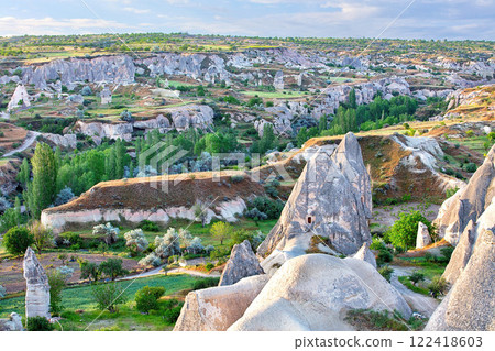 Majestic landscapes reveal the unique rock formations in Cappadocia's enchanting valleys Majestic landscapes reveal the unique rock formations in Cappadocia's enchanting valleys 122418603