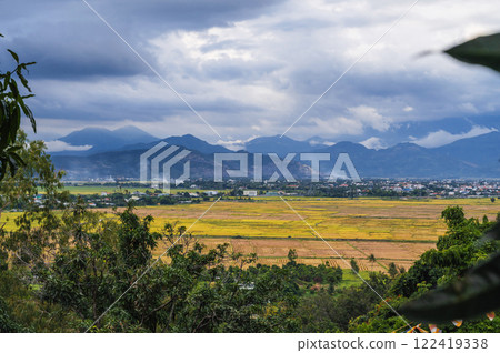 top view of rice fields with villages against background of mountains in Vietnam in Asia top view of rice fields with villages against background of mountains in Vietnam in Asia 122419338