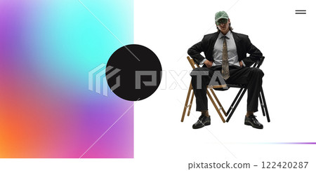 Stylish young man in suit and green cap confidently sitting on chair against white background with vibrant gradient. Stylish young man in suit and green cap confidently sitting on chair against white background with vibrant gradient. 122420287