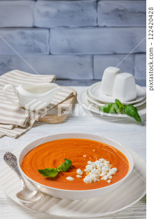roast tomato soup in a bowl, top view 122420428
