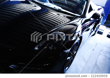 A shiny black convertible 122420939