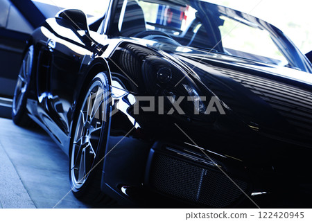 A shiny black convertible 122420945