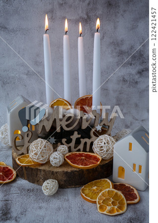 Four Advent candles calendar with Christmas zero waste decorations. Holiday preparation copy space for text. Catholic traditions of Christmas countdown new year winter Four Advent candles calendar with Christmas zero waste decorations. Holiday preparation copy space for text. Catholic traditions of Christmas countdown new year winter 122421457