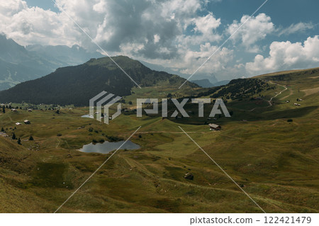 Experience the breathtaking landscape of the stunning Dolomites where natures serenity comes alive Experience the breathtaking landscape of the stunning Dolomites where natures serenity comes alive 122421479