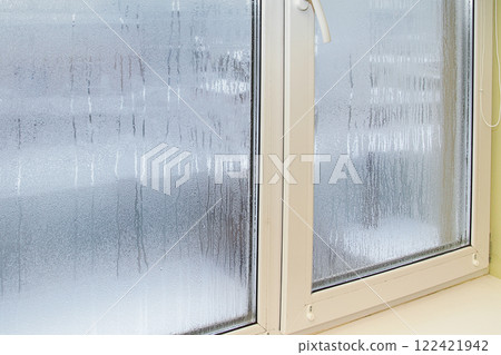 Condensation on Inside of Plastic Window 122421942