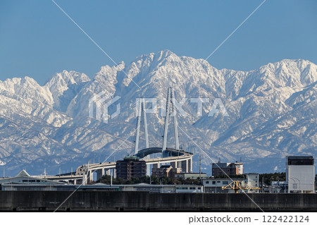 Shinminato Bridge with the Tateyama mountain range in the background 122422124