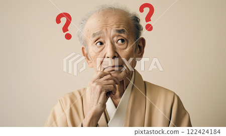 Elderly man thinking about a question and a question mark 122424184