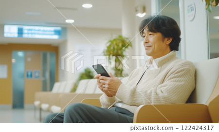 The day I waited my turn in the hospital waiting room while looking at my smartphone. The day I waited my turn in the hospital waiting room while looking at my smartphone. 122424317