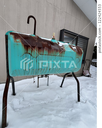 Old rusty kerosene tank 122424553