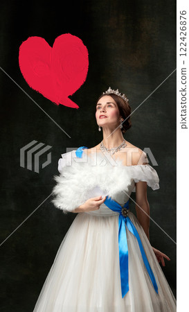 Portrait of attractive woman, medieval royal person in renaissance style dress with dreaming face and red speech bubble in shape of heart. 122426876