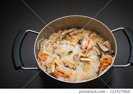 A delicious gomoku gohan made by cooking rice cakes and other rice left over from New Year's together. A delicious gomoku gohan made by cooking rice cakes and other rice left over from New Year's together. 122427668
