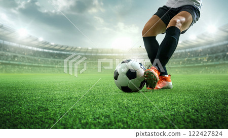 Dribbling action. Soccer player in white jersey, black shorts kicking ball in motion on green field. 3D stadium, bright lights, speed, precision 122427824