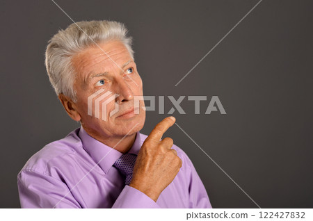 portrait of senior old nice man posing 122427832