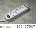 Network filter. Extension cord tee with three sockets and two USB ports for powering household electrical appliances 122427937