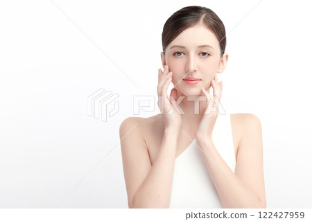Beautiful young woman with clean fresh skin on white background, Face care, Facial treatment, Cosmetology, beauty and spa, women portrait. Beautiful young woman with clean fresh skin on white background, Face care, Facial treatment, Cosmetology, beauty and spa, women portrait. 122427959