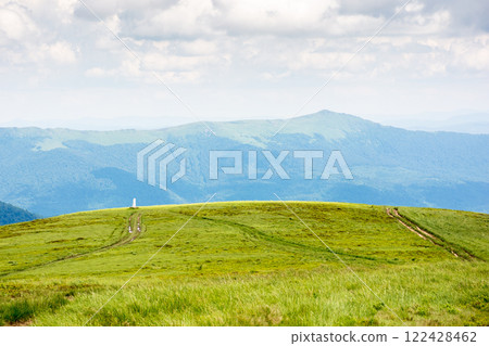 alpine meadow of mountain smooth in summer. spectacular highland wallpaper. cloudy weather. watershed ridge of ukrainian carpathians in the distance. landscape with wide open vista alpine meadow of mountain smooth in summer. spectacular highland wallpaper. cloudy weather. watershed ridge of ukrainian carpathians in the distance. landscape with wide open vista 122428462