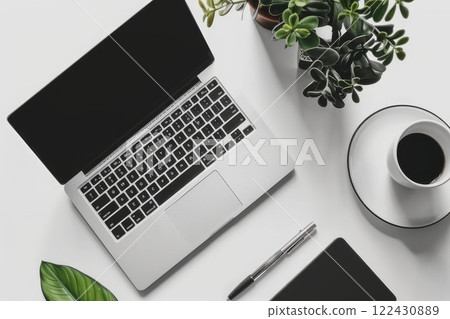 A laptop is open and placed next to a steaming cup of coffee and a green plant. AI-generated content. A laptop is open and placed next to a steaming cup of coffee and a green plant. AI-generated content. 122430889