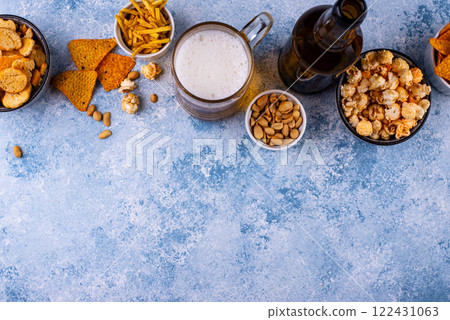 Beer and different snacks for Superbowl or football party Beer and different snacks for Superbowl or football party 122431063