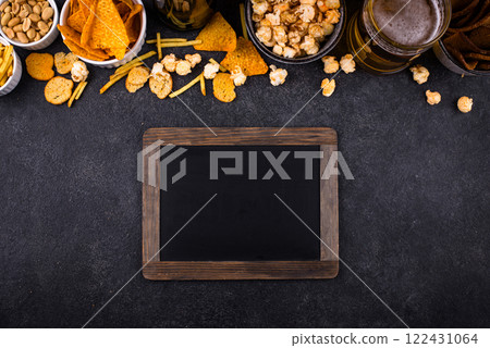 Beer and different snacks for Superbowl or football party Beer and different snacks for Superbowl or football party 122431064