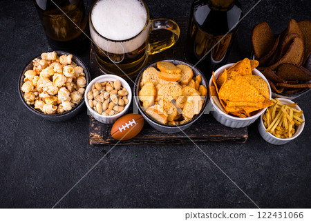 Beer and different snacks for Superbowl or football party 122431066