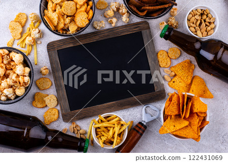 Beer and different snacks for Superbowl or football party Beer and different snacks for Superbowl or football party 122431069