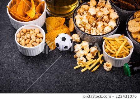 Beer and different snacks for Superbowl or football party Beer and different snacks for Superbowl or football party 122431076