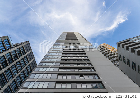 Skyscraper Perspective. Tall Modern Building with Glass and Concrete 122431101