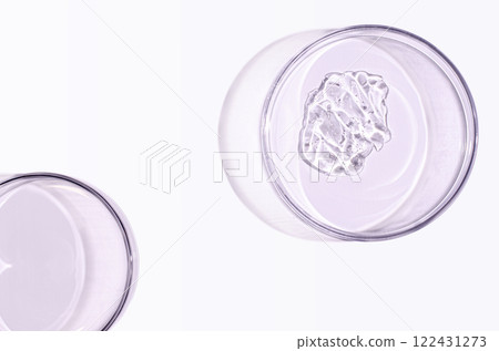 Skin serum or face wash gel in a Petri dish. For cosmetic procedures. Skin serum or face wash gel in a Petri dish. For cosmetic procedures. 122431273
