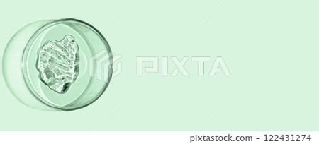 A sample of skin serum or moisturizing gel in a Petri dish. A cosmetic product. Copy space A sample of skin serum or moisturizing gel in a Petri dish. A cosmetic product. Copy space 122431274