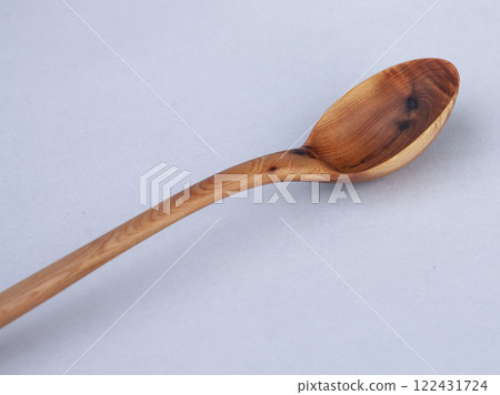 Wooden kitchen utensils stacked view close up 122431724