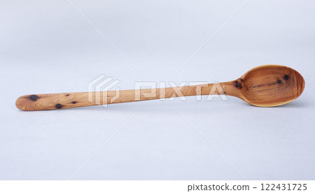 Wooden kitchen utensils stacked view close up Wooden kitchen utensils stacked view close up 122431725