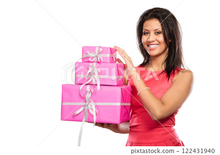 Pretty mixed race girl with boxes gifts. Christmas 122431940