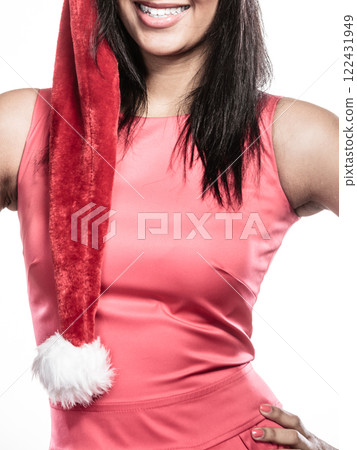 Woman mixed race santa helper hat portrait Woman mixed race santa helper hat portrait 122431949