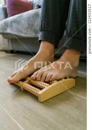A man relaxing while having a foot massage A man relaxing while having a foot massage 122432017