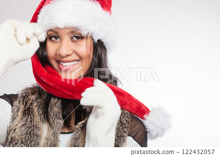 Woman mixed race santa helper hat portrait Woman mixed race santa helper hat portrait 122432057