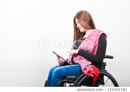 Young disabled lady with tablet. 122432192