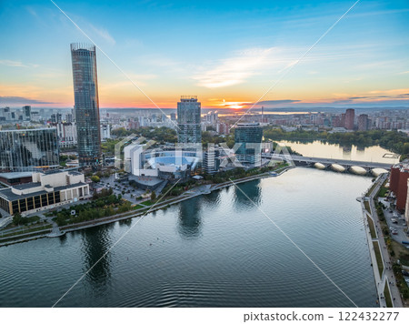 Yekaterinburg city and pond aerial panoramic view at summer or early autumn sunset. Night city in the early autumn or summer. 122432277