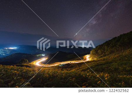 Landscape of Milky way over Tree Marigold field and light trail on mountain hill in countryside at Doi Mae U Kho, Mae Hong Son Landscape of Milky way over Tree Marigold field and light trail on mountain hill in countryside at Doi Mae U Kho, Mae Hong Son 122432562