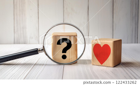 Magnifying Glass Focused on Question and Heart Blocks Magnifying Glass Focused on Question and Heart Blocks 122433262