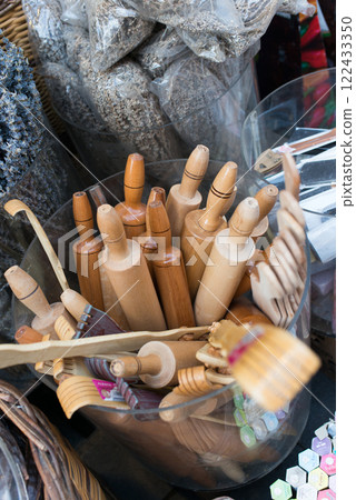 Traditional wooden rolling pins to sell in a market 122433350