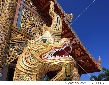 Golden Statue Dragon detail at Wat Phra Singh Woramahawihan temple, Chiang Mai, Thailand Golden Statue Dragon detail at Wat Phra Singh Woramahawihan temple, Chiang Mai, Thailand 122433373
