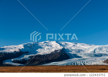 Glacier on the mountain range above Jokulsarlon glacial lake on the island of Iceland Glacier on the mountain range above Jokulsarlon glacial lake on the island of Iceland 122433751