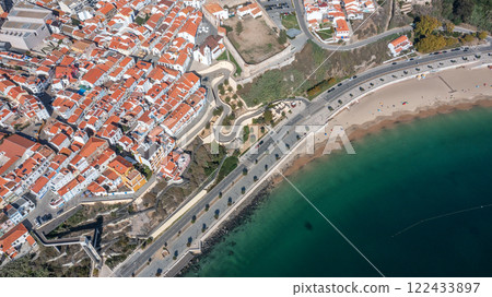 Aerial panorama of city of Sines, Setubal Alentejo Portugal Europe. Aerial view of old town fishing port, historic center and castle and beach. 122433897