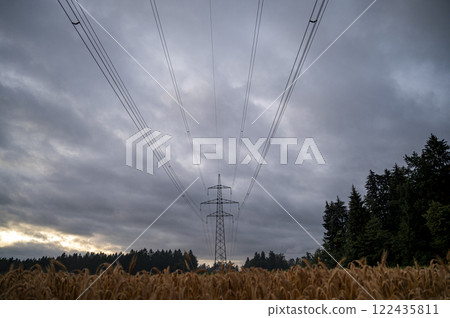 Power lines under stormy skies Power lines under stormy skies 122435811