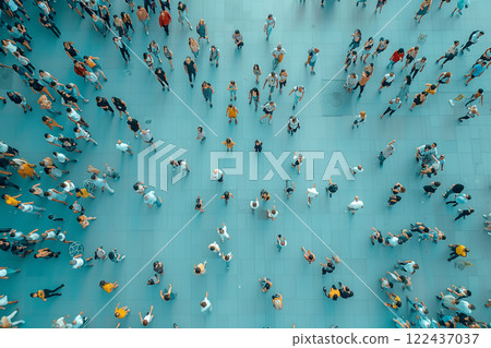 A crowd of people are walking on a sidewalk. top view 122437037