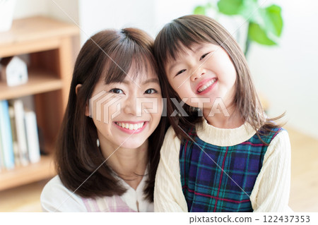 Mother and girl portrait 122437353